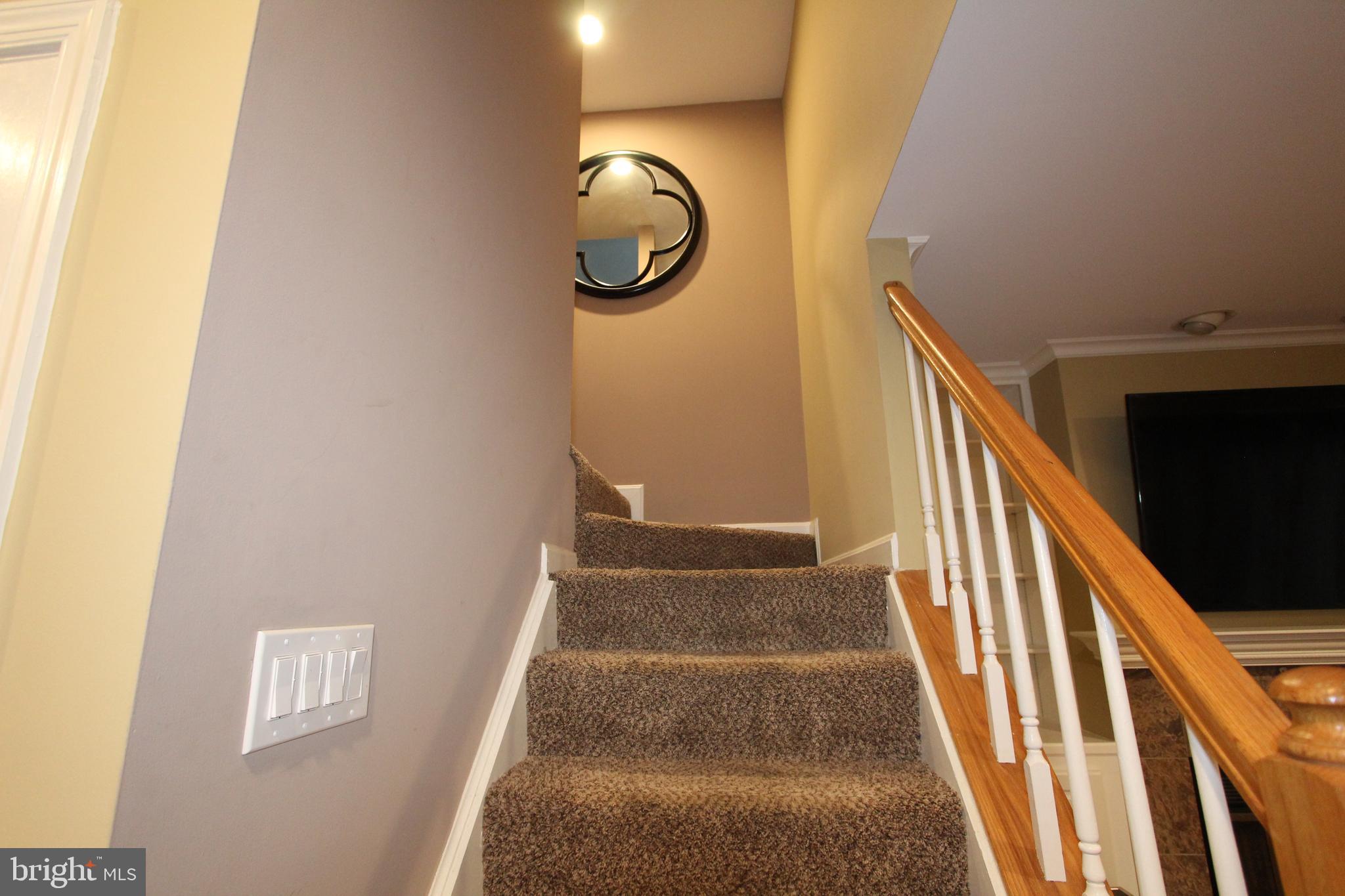 5145 Columbia Road, Unit 831 Columbia, MD 21044 - Photo 27 of 38 Basement stairs