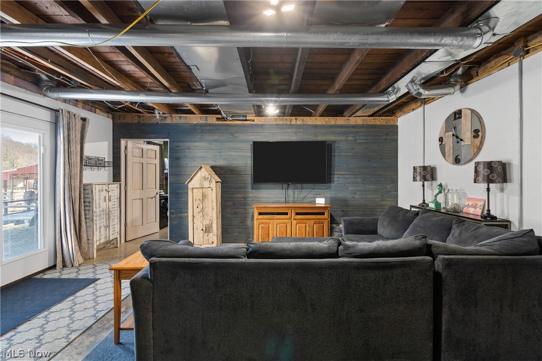 29395 Beitler Road Dennison, OH 44621 - Photo 18 of 33 Living room with wooden walls