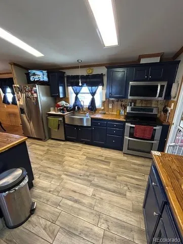 a room with furniture and a flat screen tv