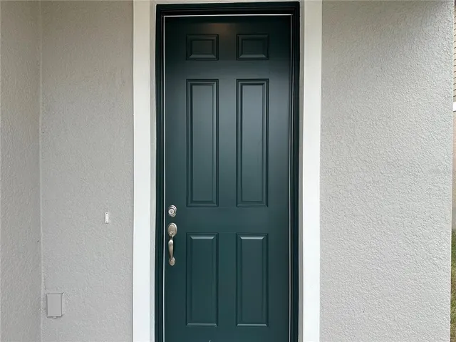 a kitchen with a sink stove top oven and microwave
