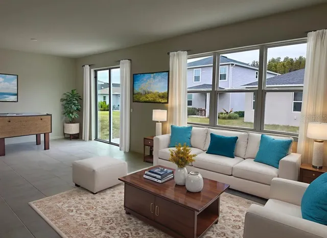 a view of a kitchen and window in a room