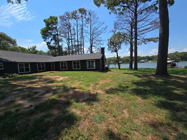 front view of a house with a big yard