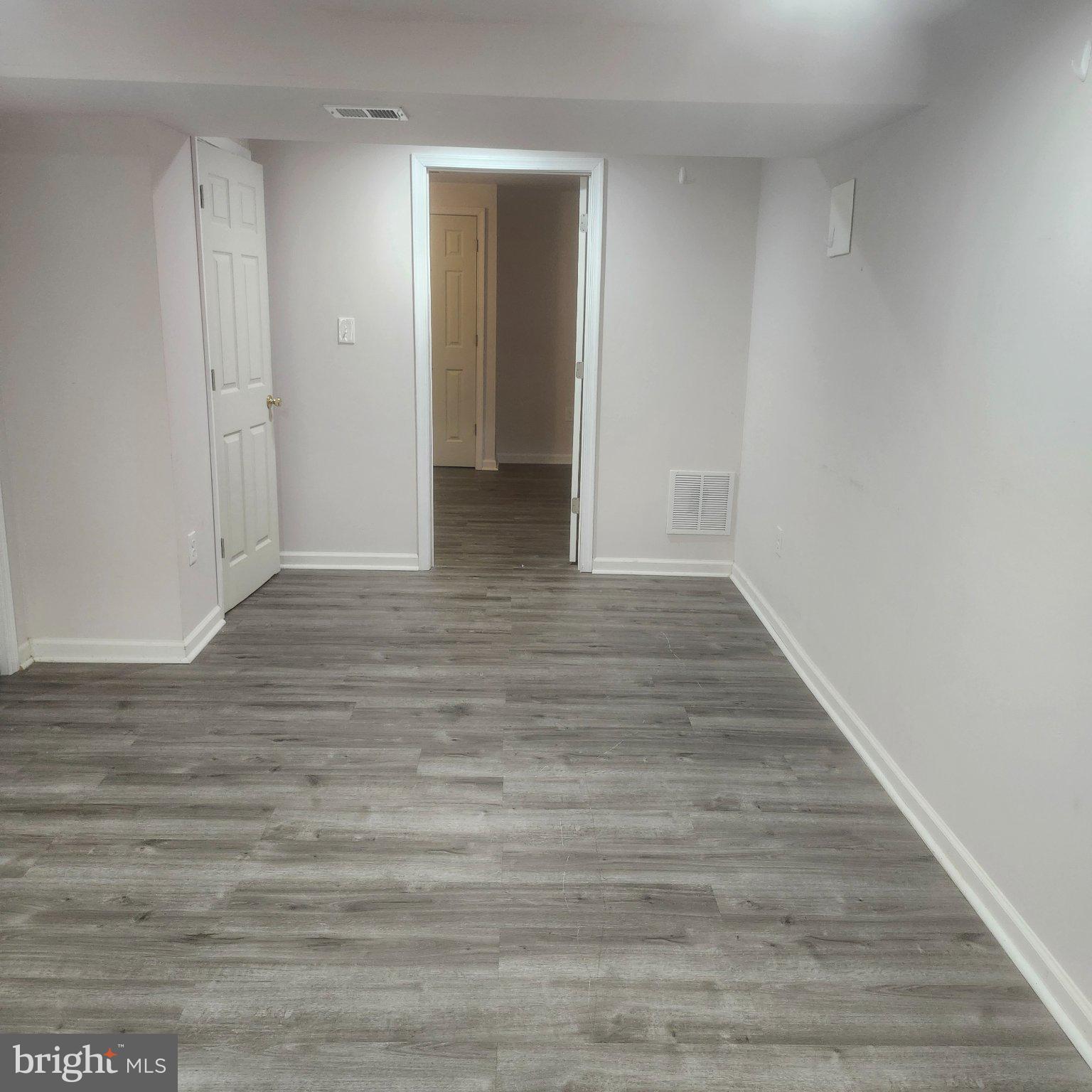 12505 Kingsview Street Bowie, MD 20721 - Photo 12 of 20 Spacious, versatile living area awaits.