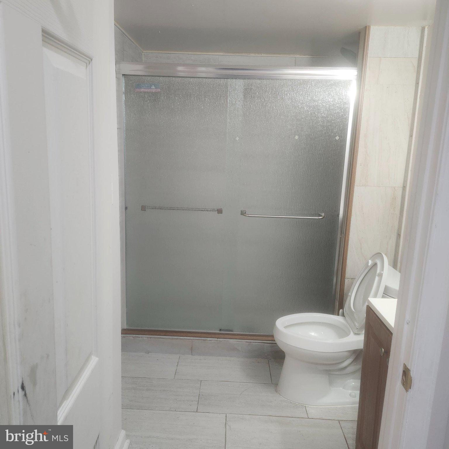 12505 Kingsview Street Bowie, MD 20721 - Photo 17 of 20 Modern bathroom with sleek finishes.