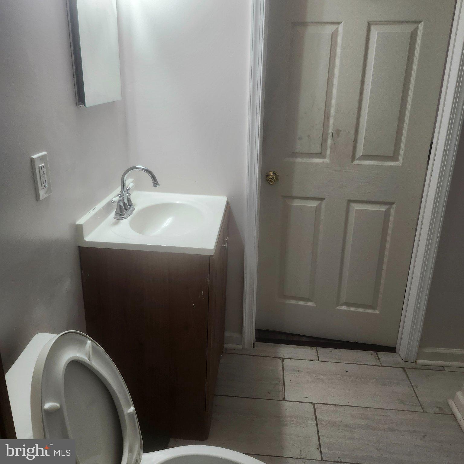 12505 Kingsview Street Bowie, MD 20721 - Photo 19 of 20 Modern bathroom with sleek finishes.