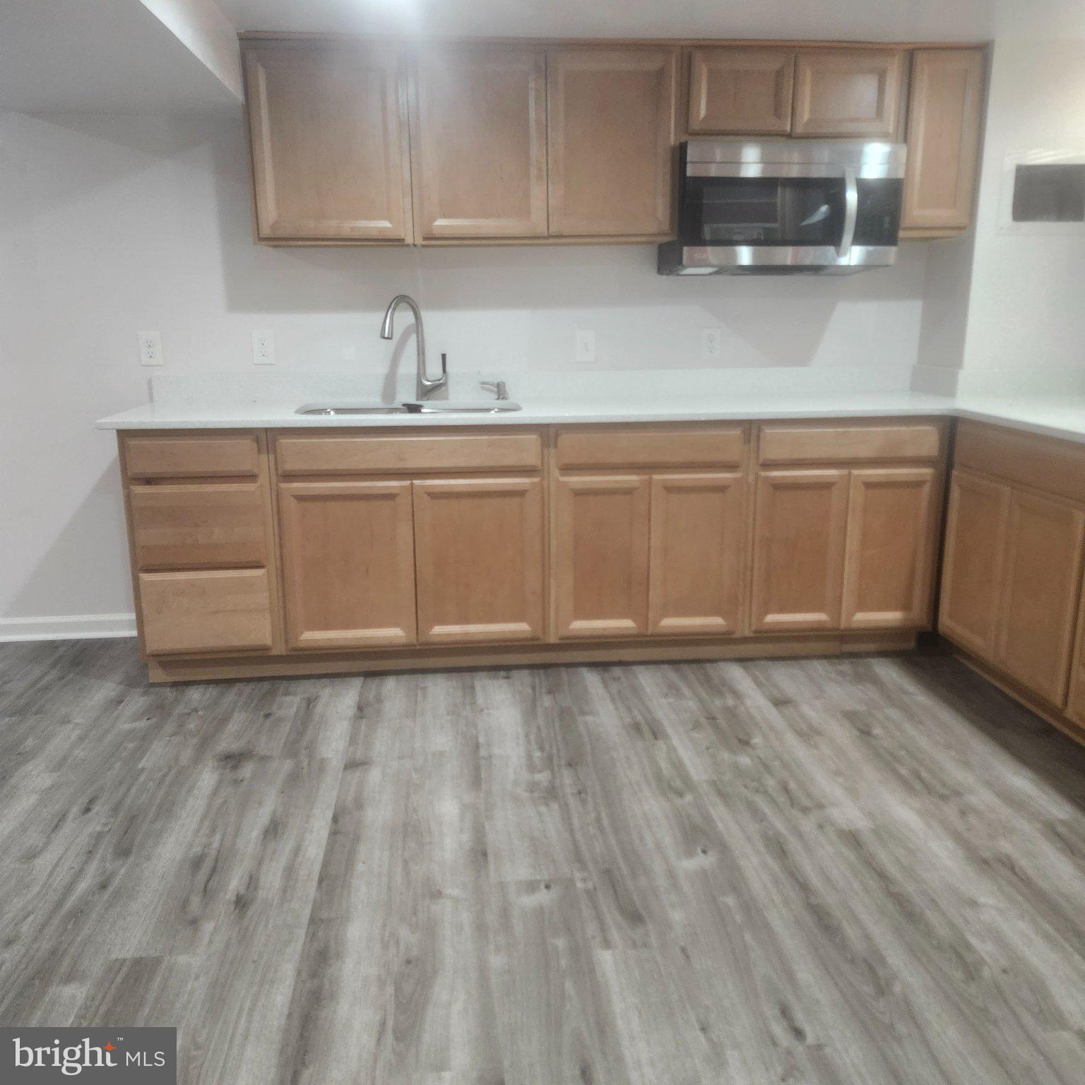 12505 Kingsview Street Bowie, MD 20721 - Photo 5 of 20 Modern kitchen with sleek finishes.