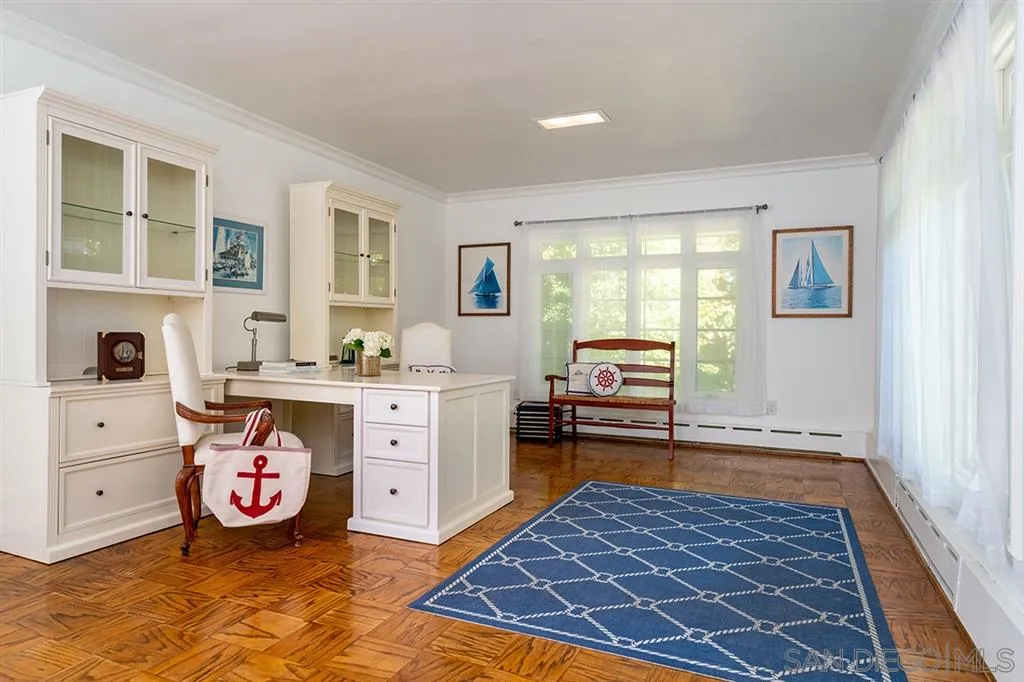 685 Ocean Boulevard Coronado, CA 92118 - Photo 12 of 16 a bedroom with a bed and a window