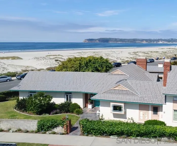 685 Ocean Boulevard Coronado, CA 92118 - Photo 16 of 16 a aerial view of a house with a yard and ocean view