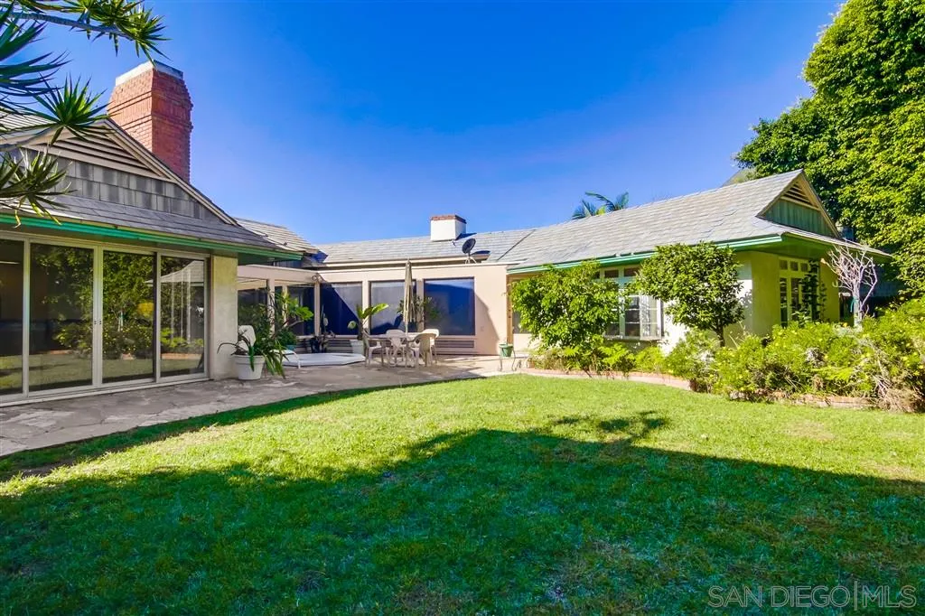 685 Ocean Boulevard Coronado, CA 92118 - Photo 4 of 16 a front view of a house with swimming pool having outdoor seating