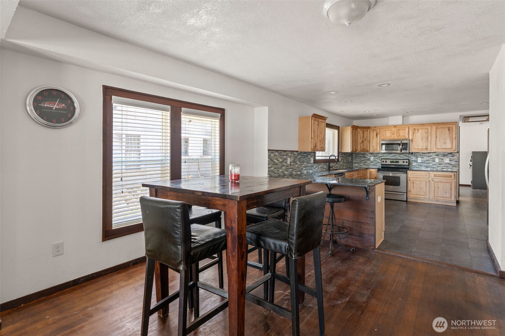 226 Southwest Lewis Street Chehalis, WA 98532 - Photo 11 of 27 a kitchen with a table and chairs in it