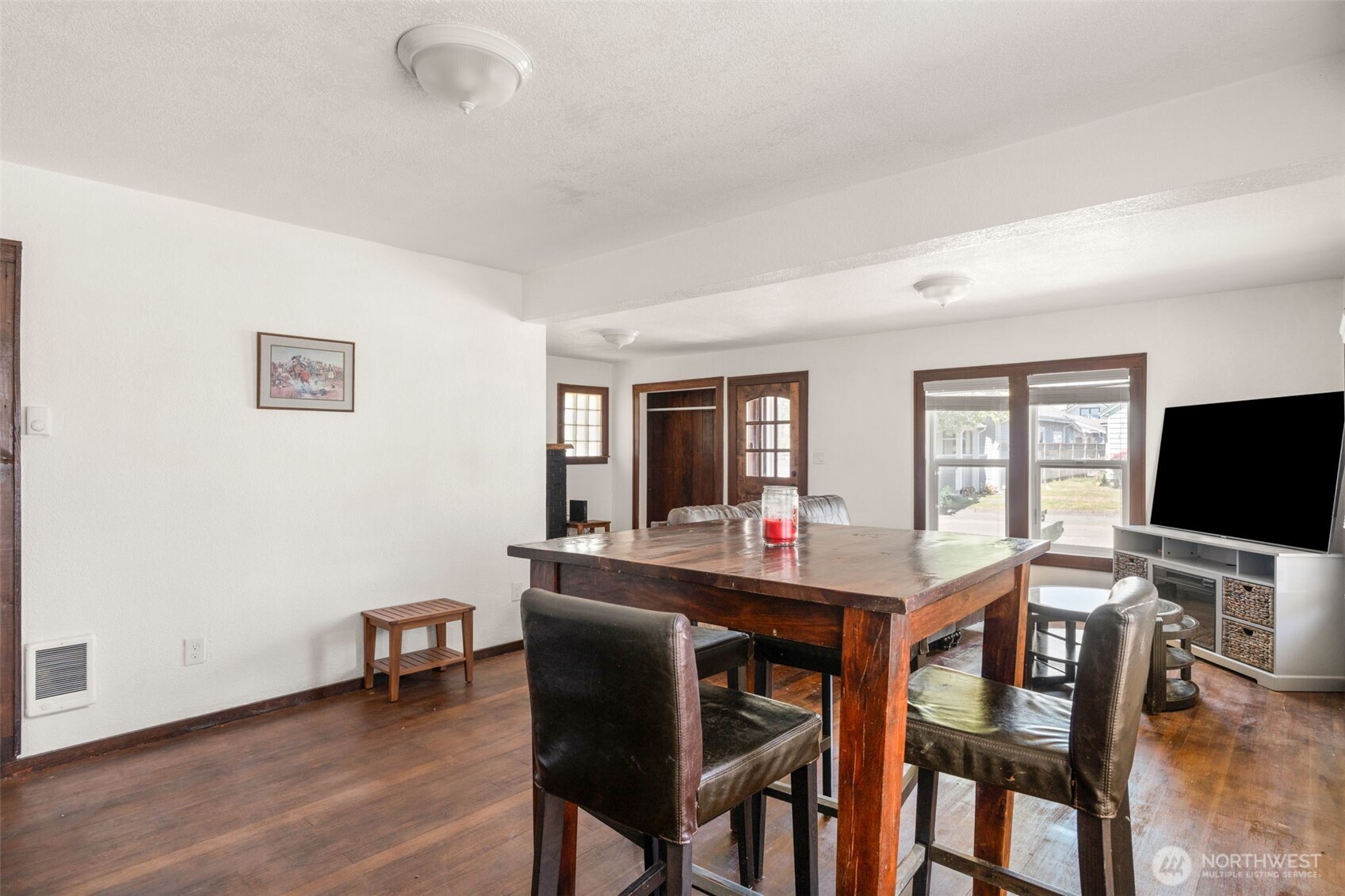226 Southwest Lewis Street Chehalis, WA 98532 - Photo 12 of 27 a view of a dining room with furniture and wooden floor