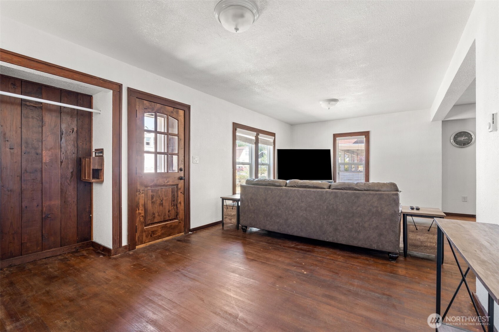226 Southwest Lewis Street Chehalis, WA 98532 - Photo 7 of 27 a living room with furniture and a flat screen tv