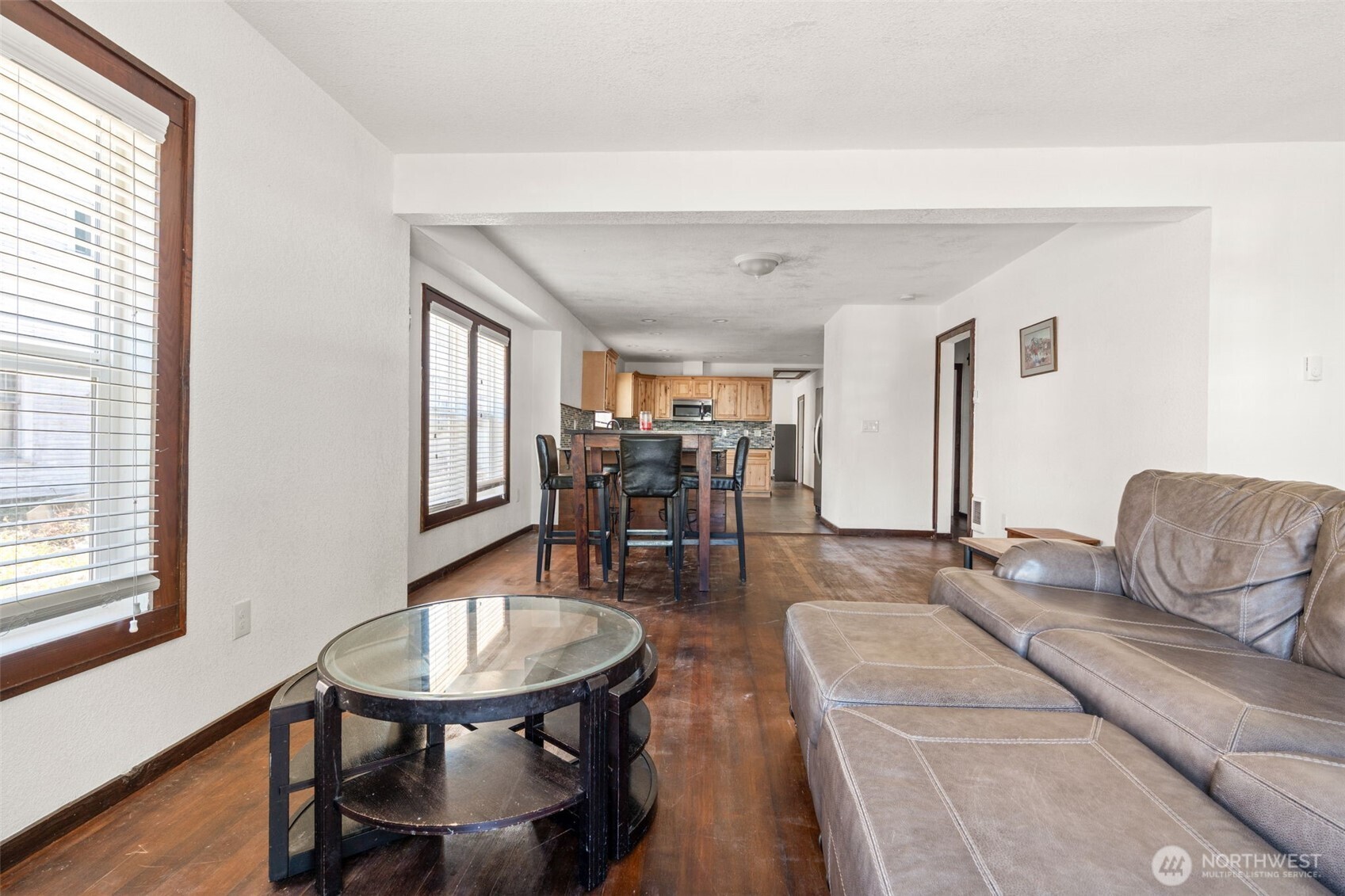 226 Southwest Lewis Street Chehalis, WA 98532 - Photo 10 of 27 a living room with furniture and a wooden floor