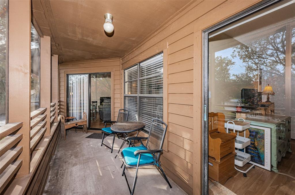 802 Lennox Road West, Unit 802 Palm Harbor, FL 34683 - Photo 20 of 42 a view of a workspace with furniture and a window