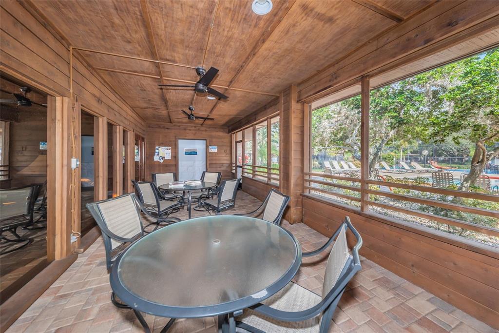 802 Lennox Road West, Unit 802 Palm Harbor, FL 34683 - Photo 36 of 42 a view of a dining room with furniture window and outside view