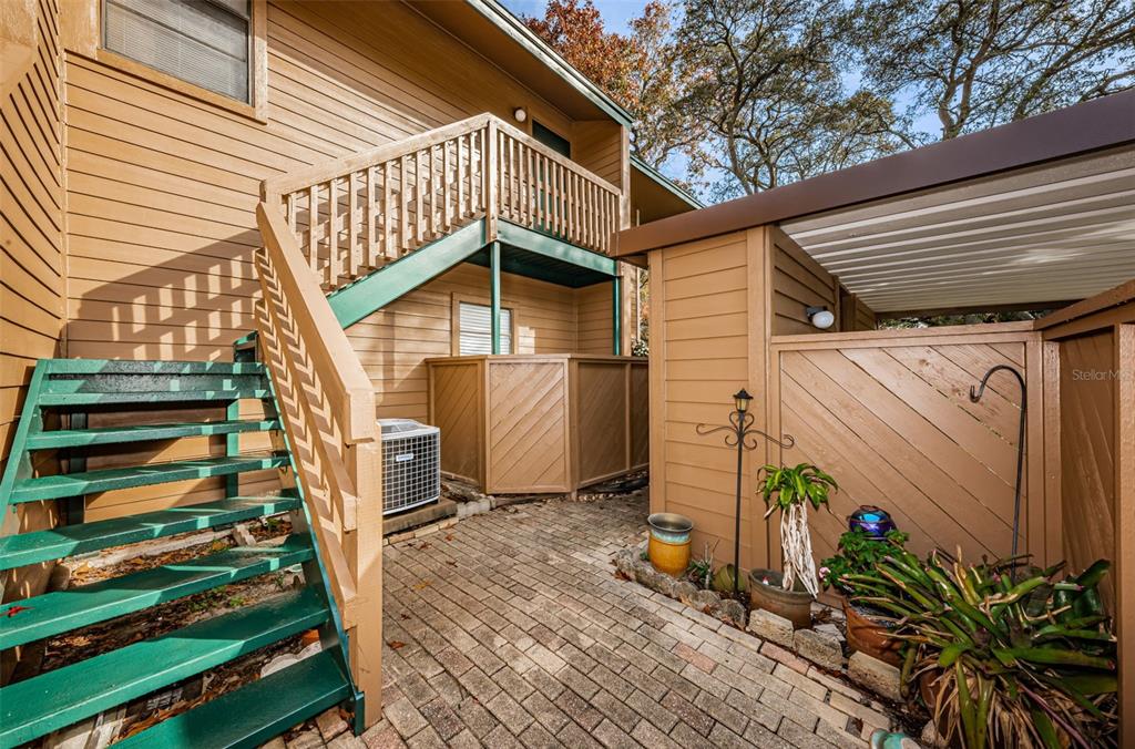 802 Lennox Road West, Unit 802 Palm Harbor, FL 34683 - Photo 4 of 42 a front view of a house with a yard