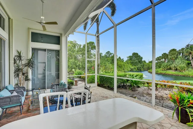 an aerial view of a houses with outdoor space and street view