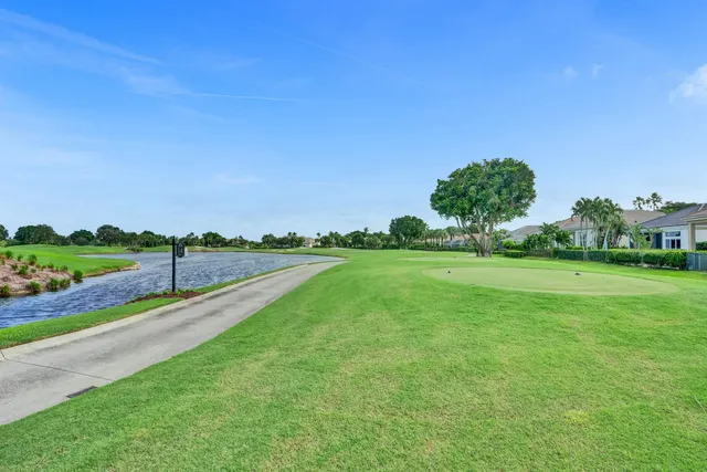 a view of a patio with couches and a fire pit