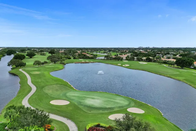 a view of a porch with chairs and a table