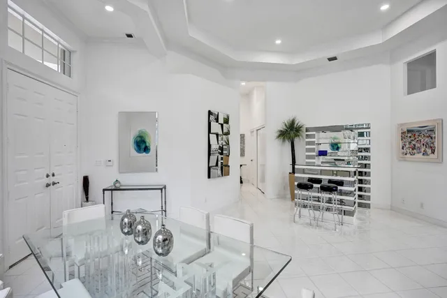 a living room with furniture a couch and a window