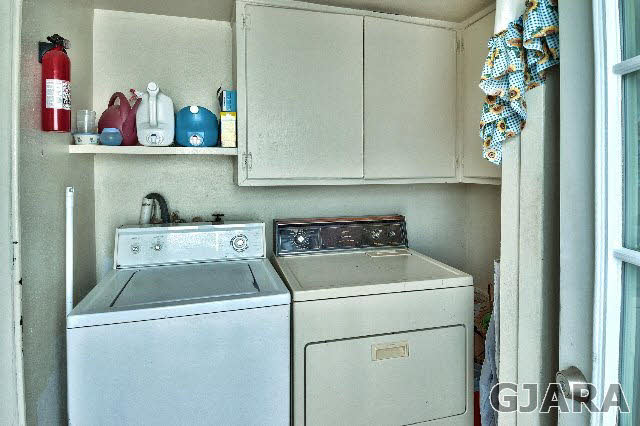 1404 Q Road Loma, CO 81524 - Photo 16 of 31 a utility room with dryer and washer