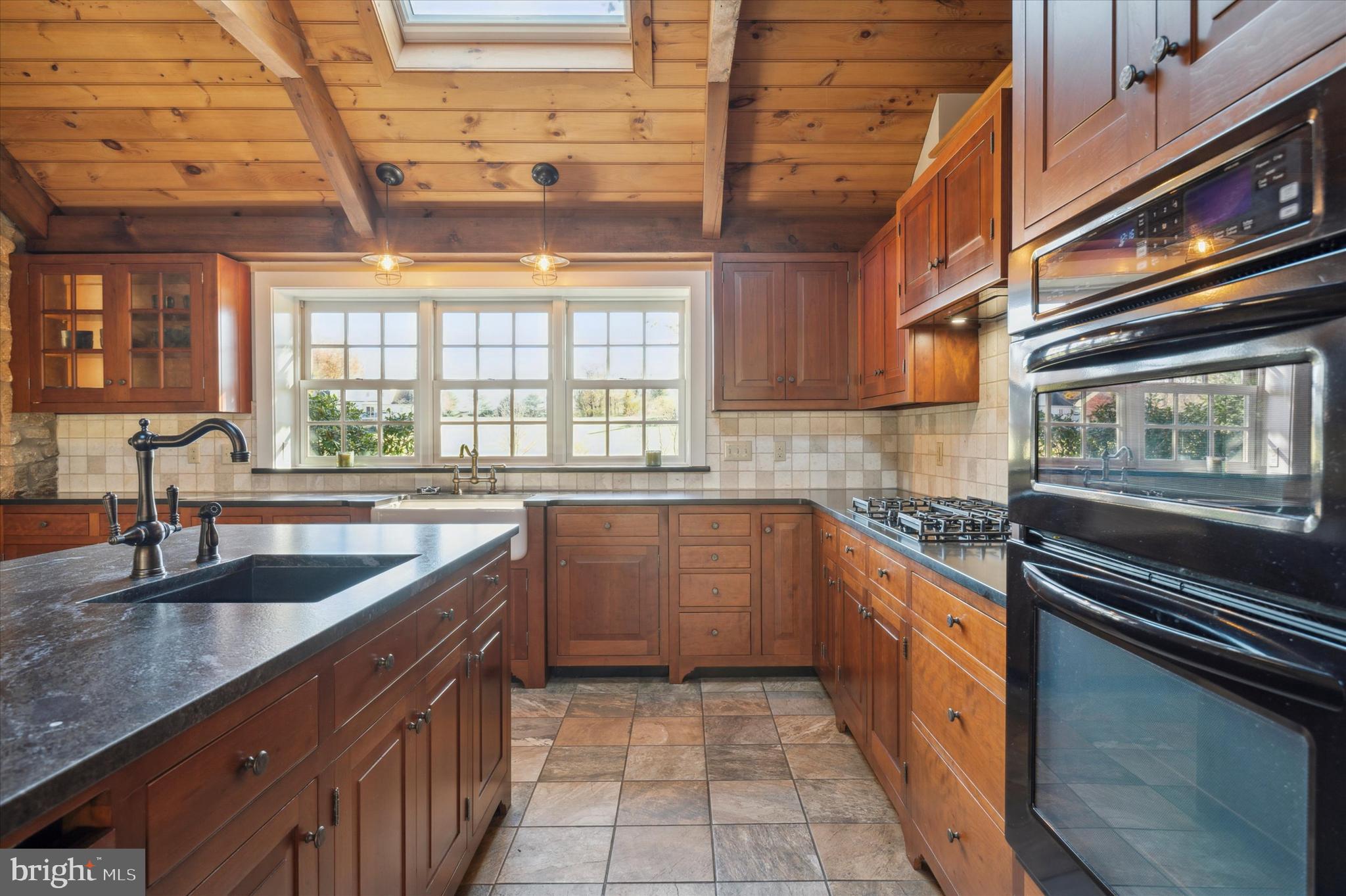 2 Fox Run Road Chester Springs, PA 19425 - Photo 21 of 103 a kitchen with stainless steel appliances granite countertop a sink and stove