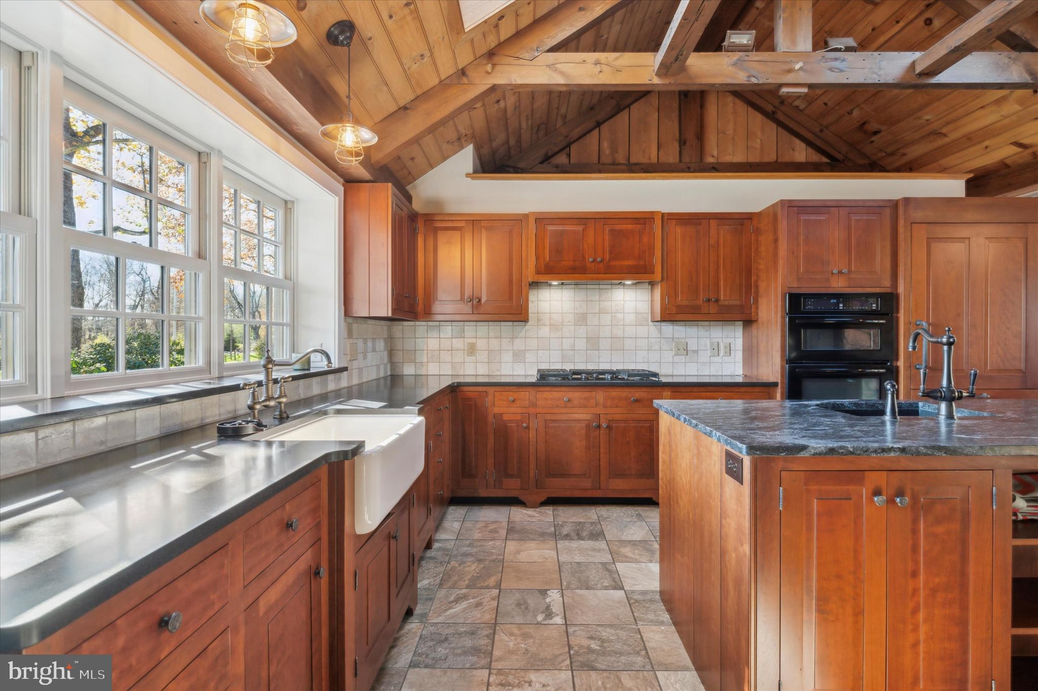 2 Fox Run Road Chester Springs, PA 19425 - Photo 23 of 103 a kitchen with stainless steel appliances granite countertop a sink window and cabinets