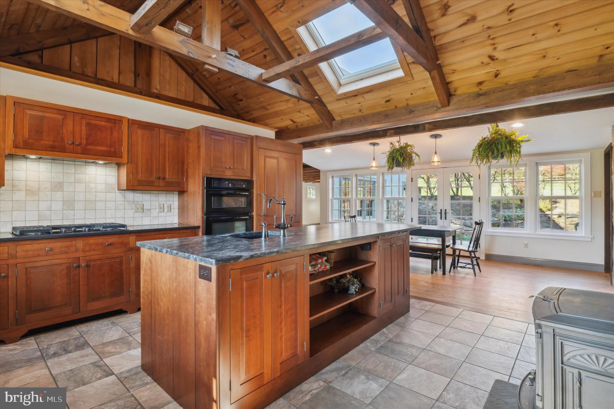 2 Fox Run Road Chester Springs, PA 19425 - Photo 24 of 103 a open kitchen with stainless steel appliances granite countertop a stove and cabinets