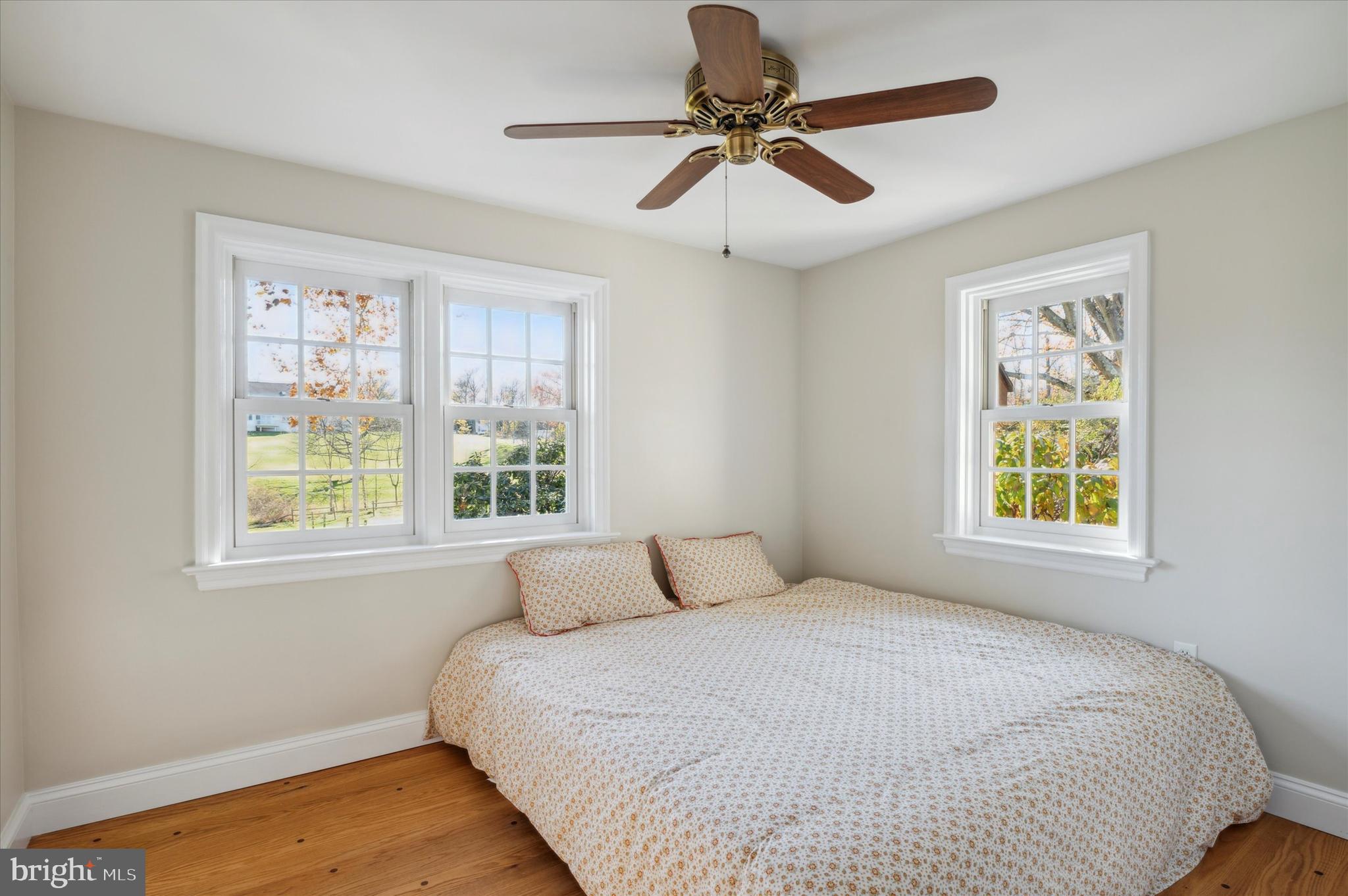 2 Fox Run Road Chester Springs, PA 19425 - Photo 32 of 103 a bedroom with a large bed and a window