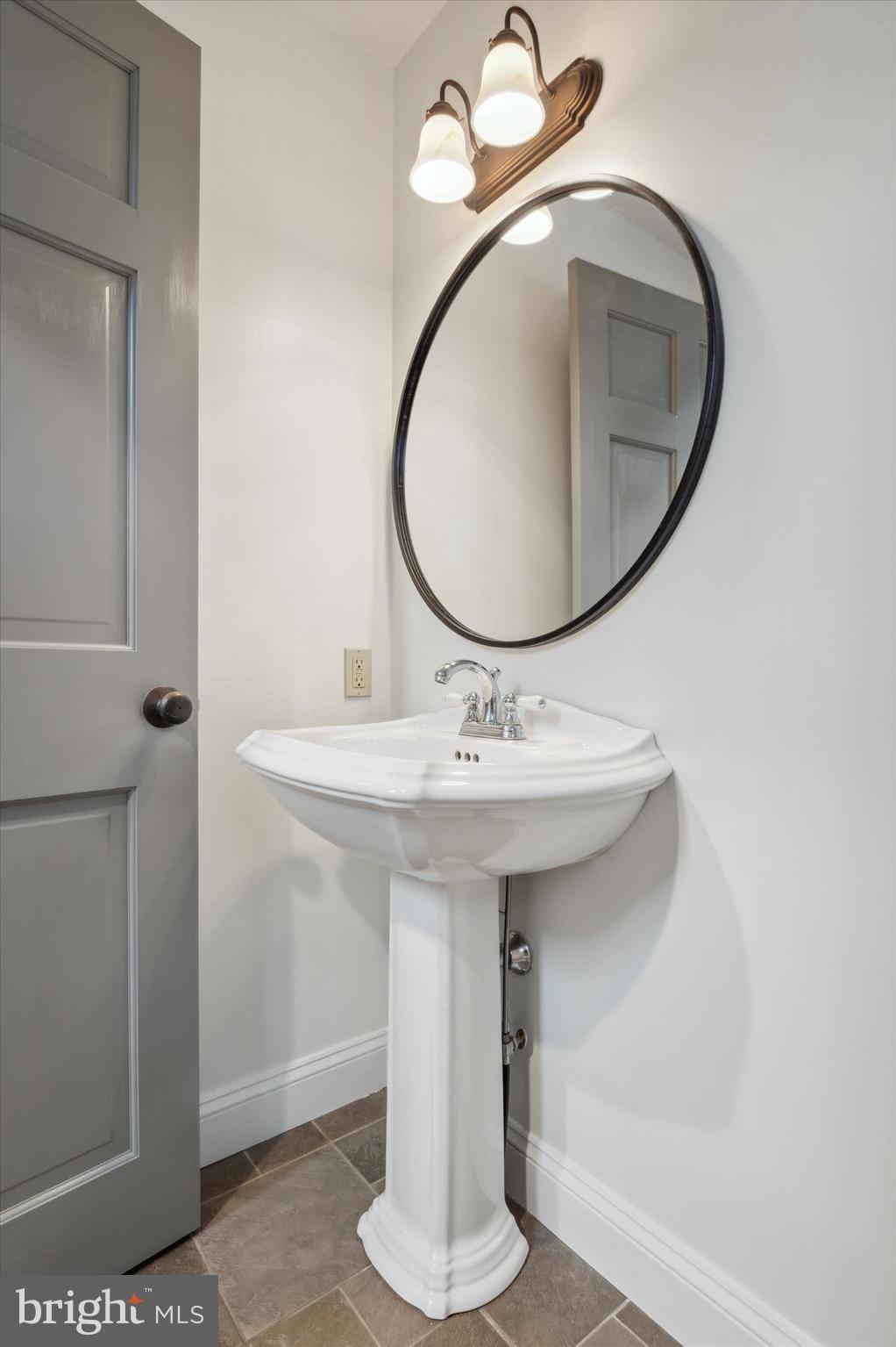2 Fox Run Road Chester Springs, PA 19425 - Photo 34 of 103 a bathroom with a sink and a mirror