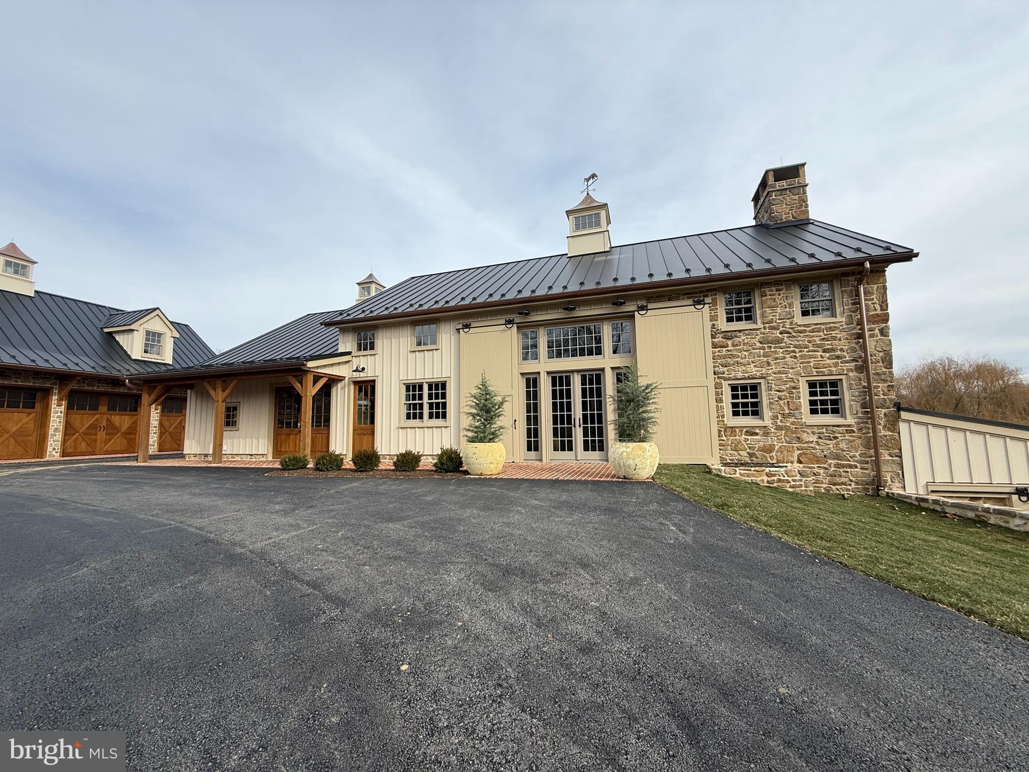 2 Fox Run Road Chester Springs, PA 19425 - Photo 5 of 103 a front view of a house with a yard