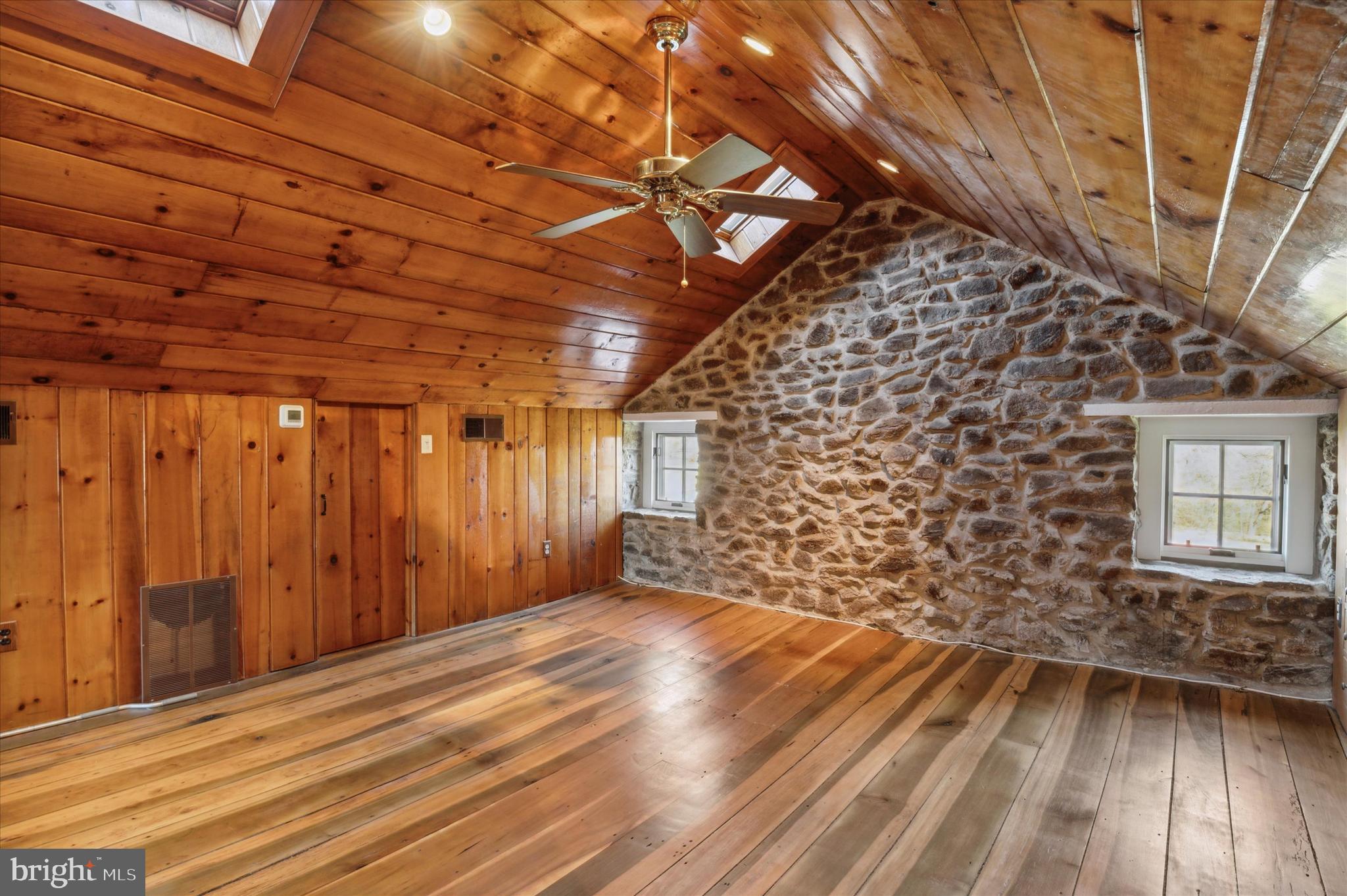 2 Fox Run Road Chester Springs, PA 19425 - Photo 57 of 103 a view of an empty room with wooden floor and a window