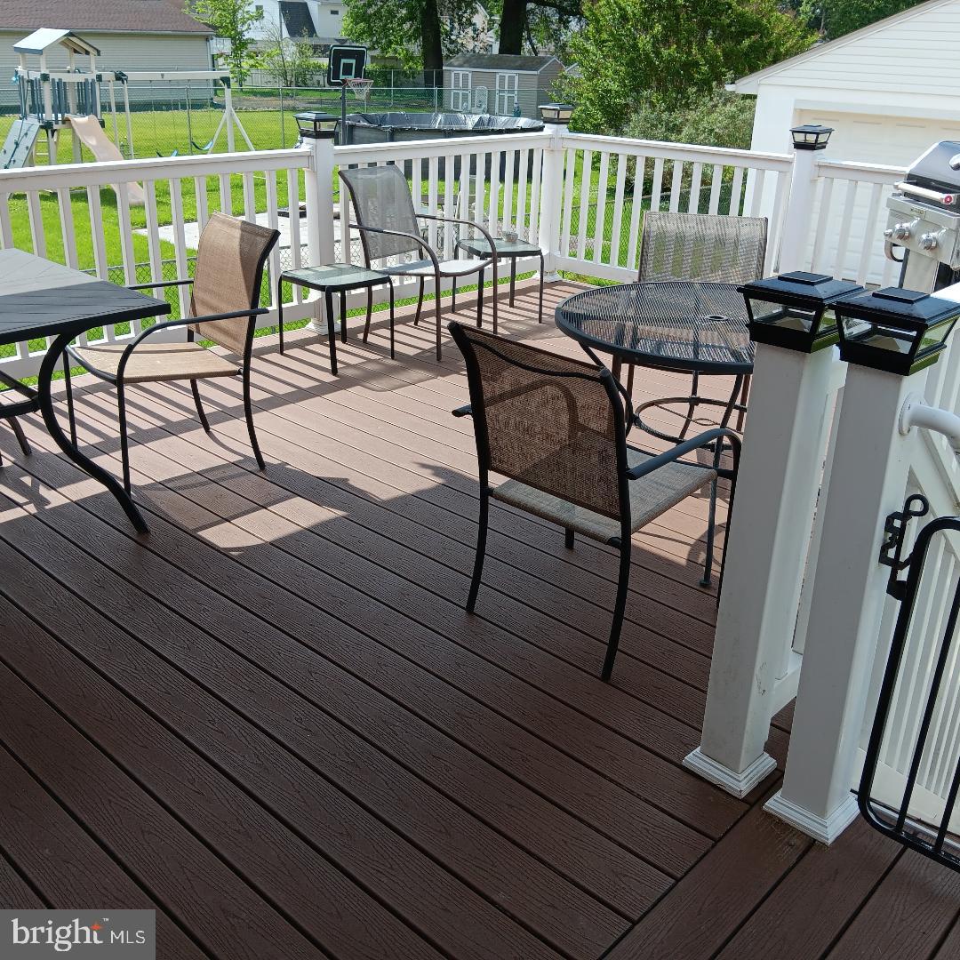 343 Nicholson Road Essex, MD 21221 - Photo 54 of 59 a view of a chairs on wooden deck