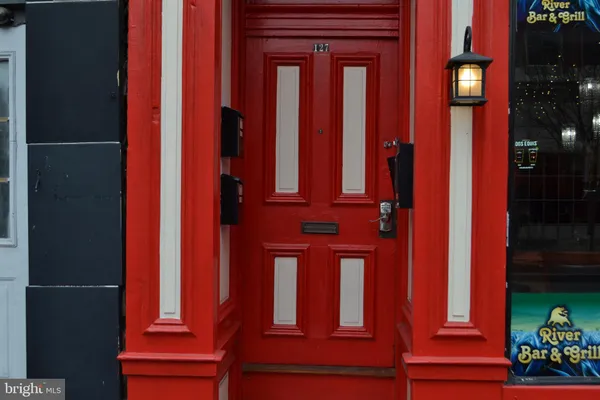 a view of front door with stairs