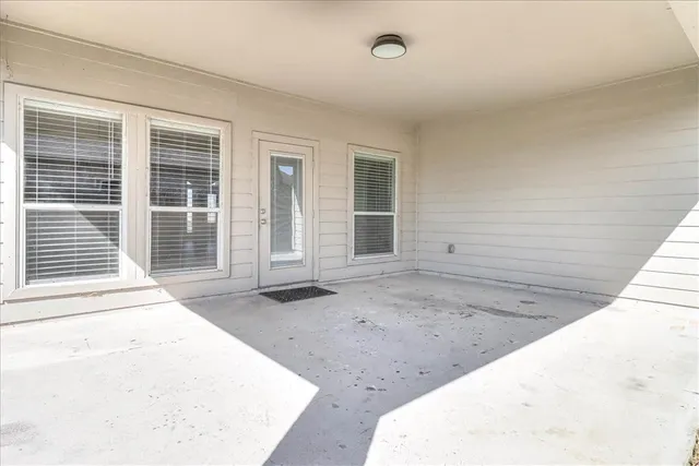 a view of backyard of a house