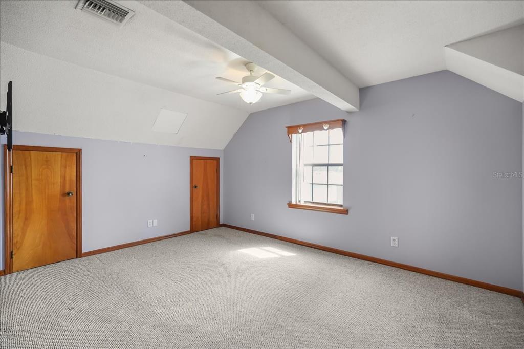 3303 Massee Road Davenport, FL 33837 - Photo 20 of 40 an empty room with windows and closet