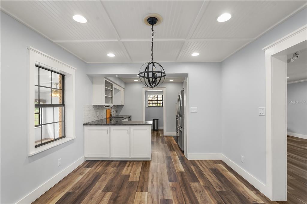 3303 Massee Road Davenport, FL 33837 - Photo 7 of 40 a view of a room with a window and wooden floor