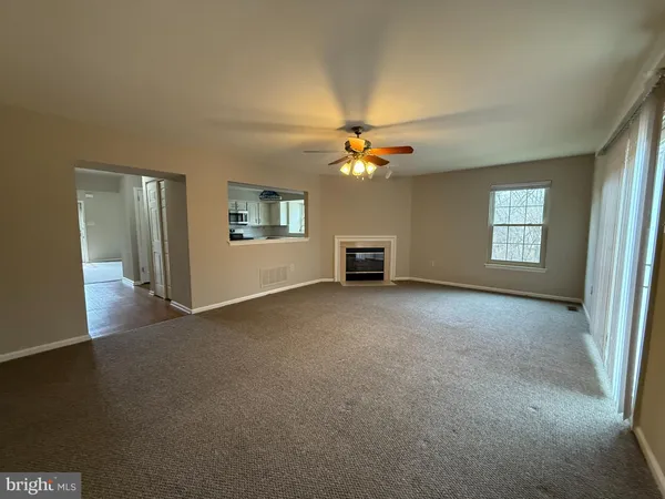 a view of a livingroom with a fireplace