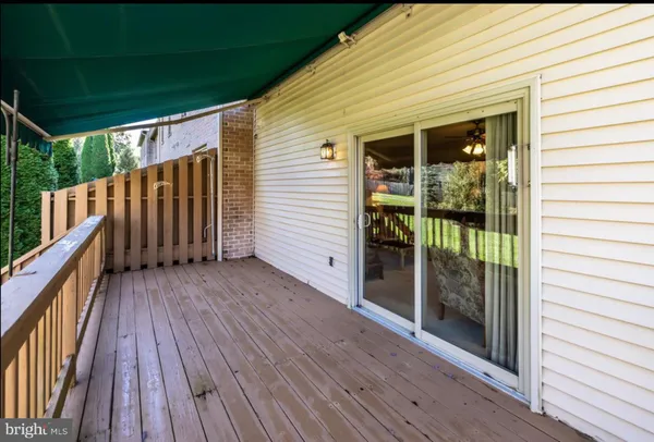 a view of backyard with small cabin