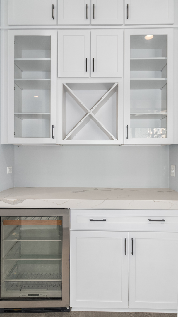 635 North Main Street Naperville, IL 60563 - Photo 14 of 26 a view of a room with rack on the wall