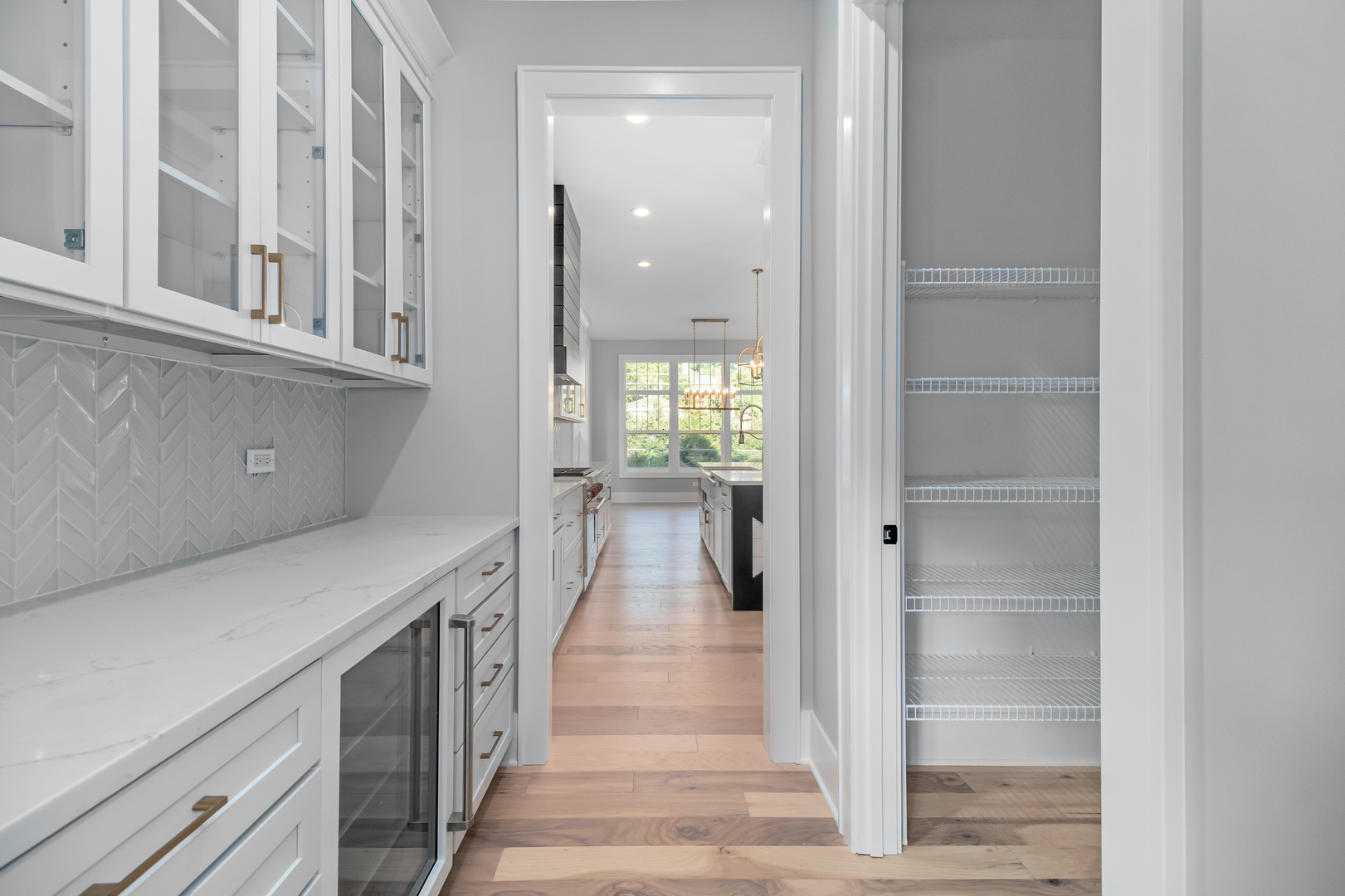 635 North Main Street Naperville, IL 60563 - Photo 20 of 26 a view of a hallway with wooden floor and staircase
