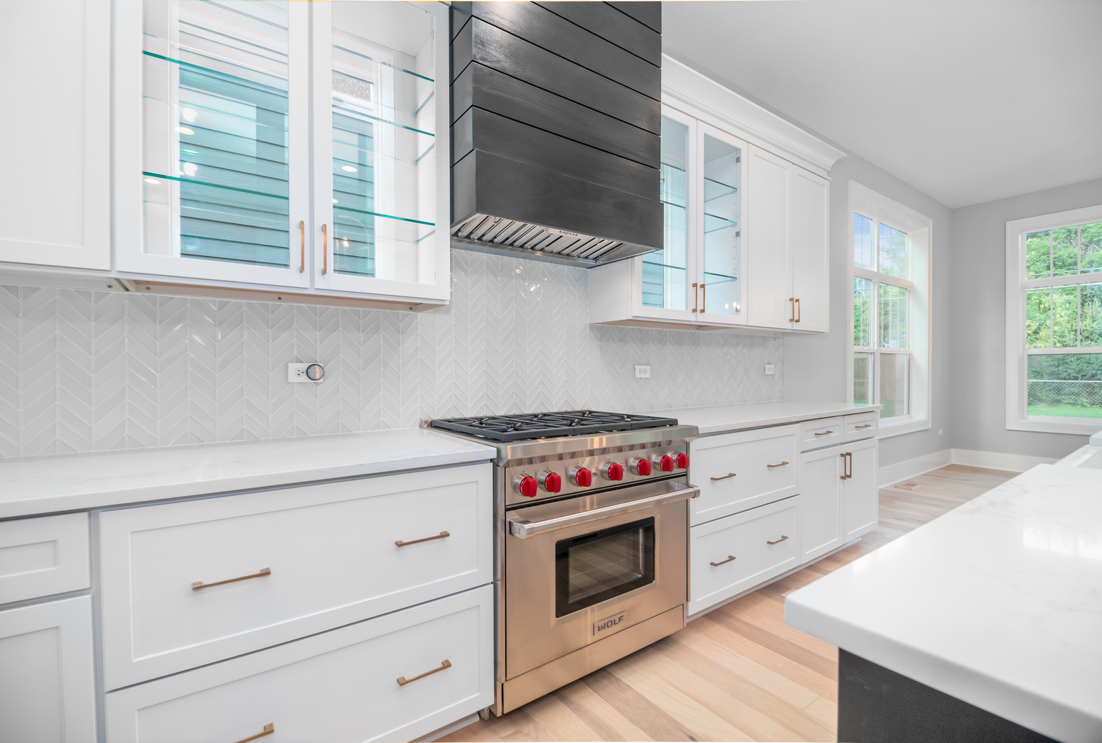 635 North Main Street Naperville, IL 60563 - Photo 22 of 26 a kitchen with cabinets appliances and a window