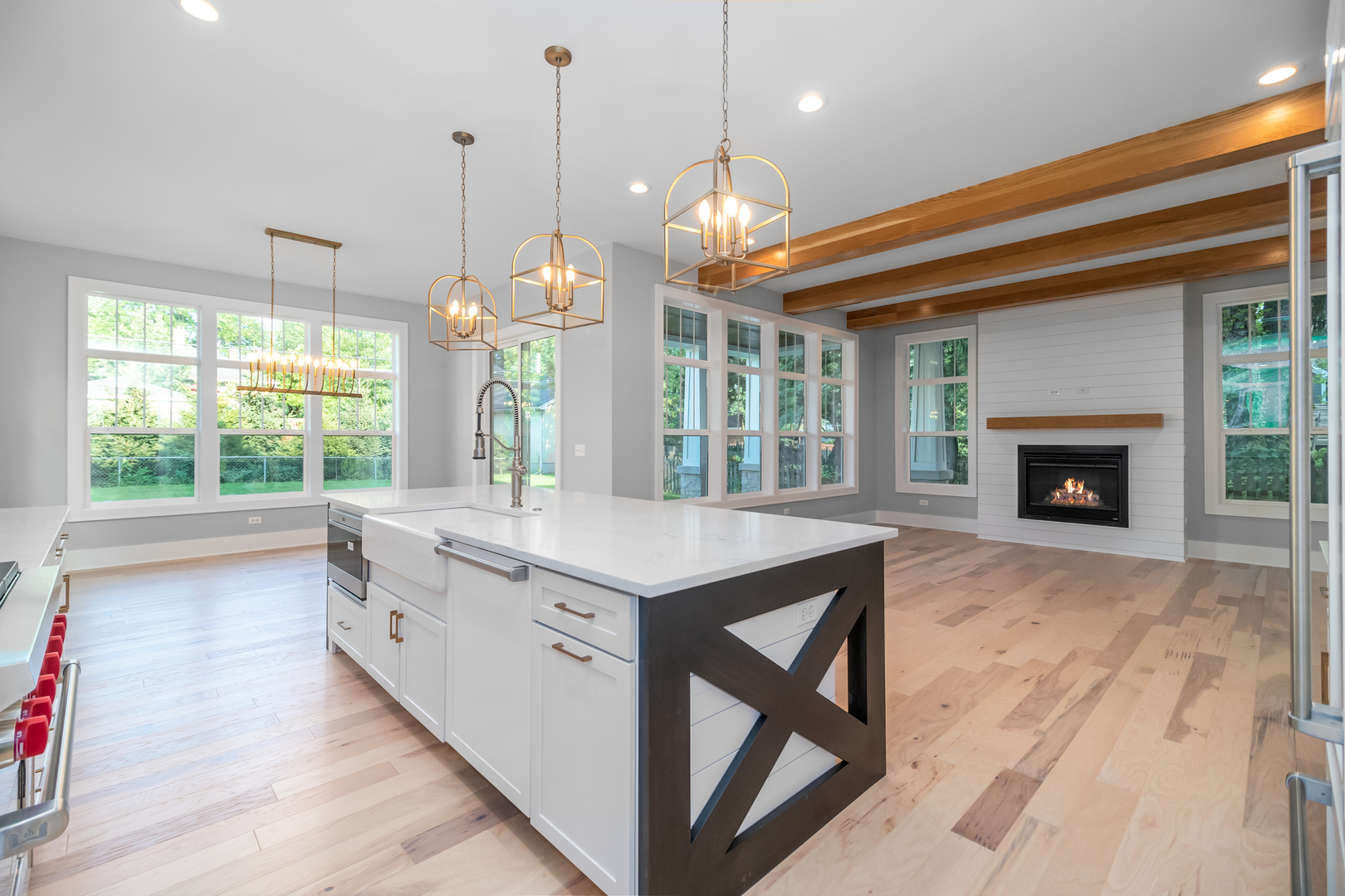 635 North Main Street Naperville, IL 60563 - Photo 23 of 26 a kitchen with kitchen island a stove a island a stove and wooden floor