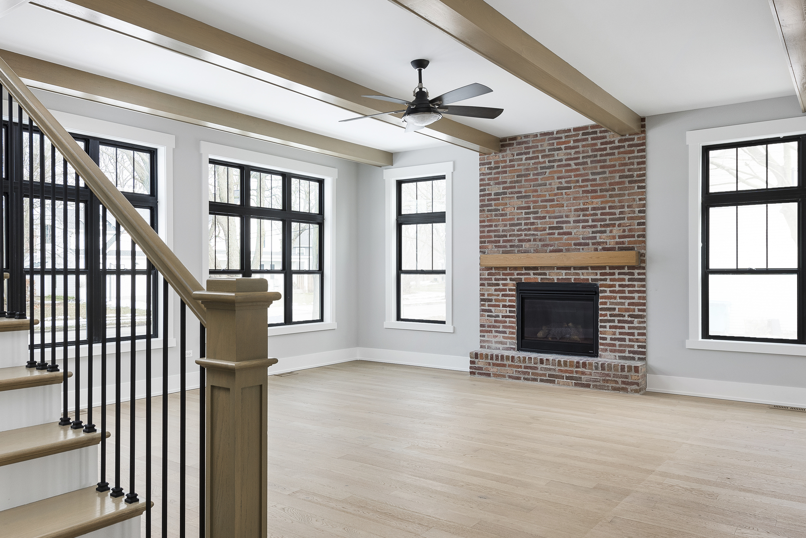 635 North Main Street Naperville, IL 60563 - Photo 6 of 26 a view of an empty room with wooden floor and a window