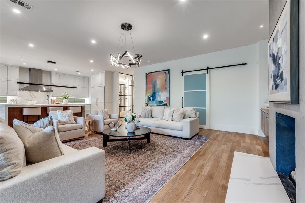 5111 West Amherst Avenue Dallas, TX 75209 - Photo 11 of 36 a living room with furniture and a large window