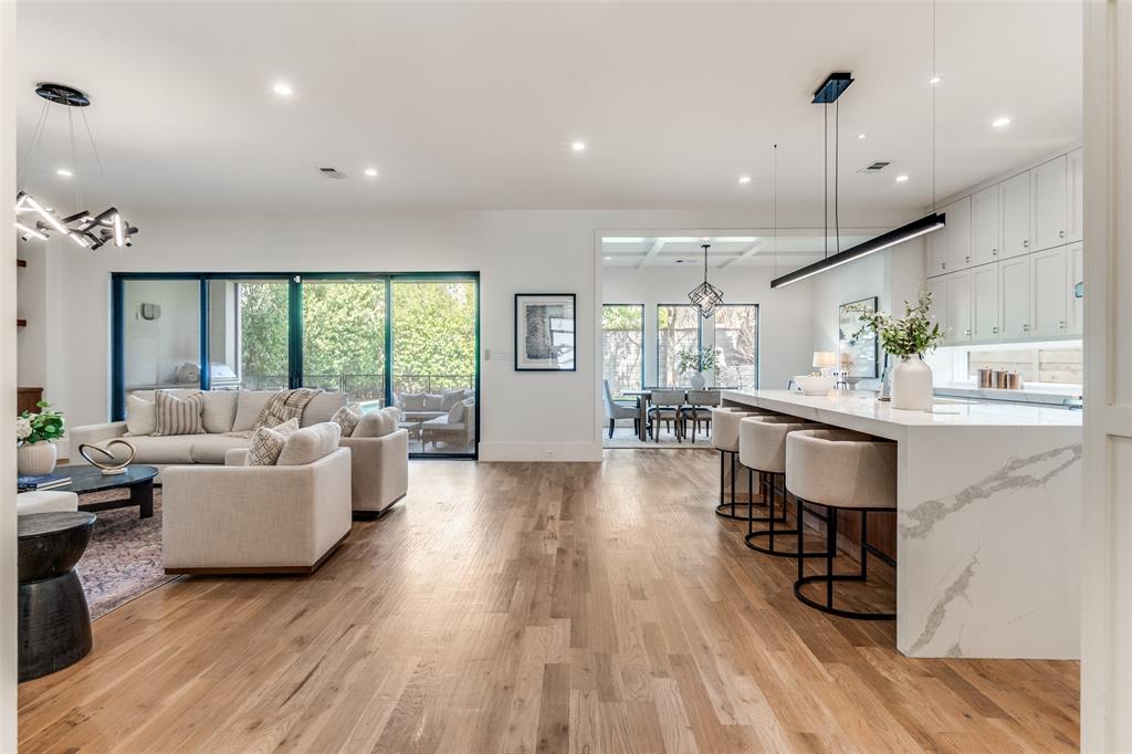 5111 West Amherst Avenue Dallas, TX 75209 - Photo 14 of 36 a living room with furniture and a wooden floor
