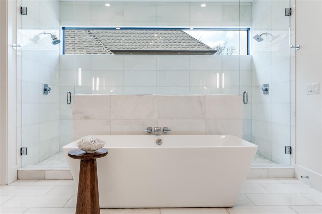 5111 West Amherst Avenue Dallas, TX 75209 - Photo 26 of 36 a white bath tub sitting next to a white sink