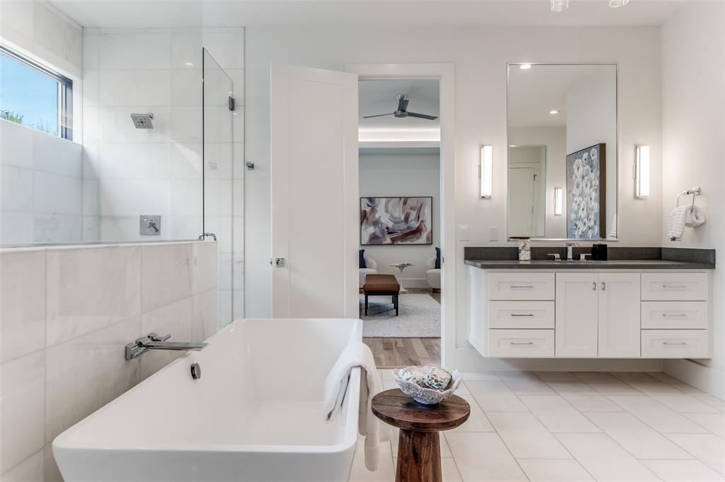 5111 West Amherst Avenue Dallas, TX 75209 - Photo 27 of 36 a bathroom with a bathtub sink and toilet