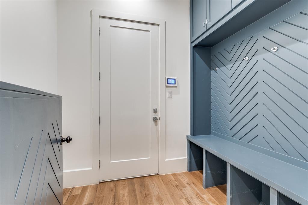 5111 West Amherst Avenue Dallas, TX 75209 - Photo 31 of 36 a view of walk in closet with wooden floor
