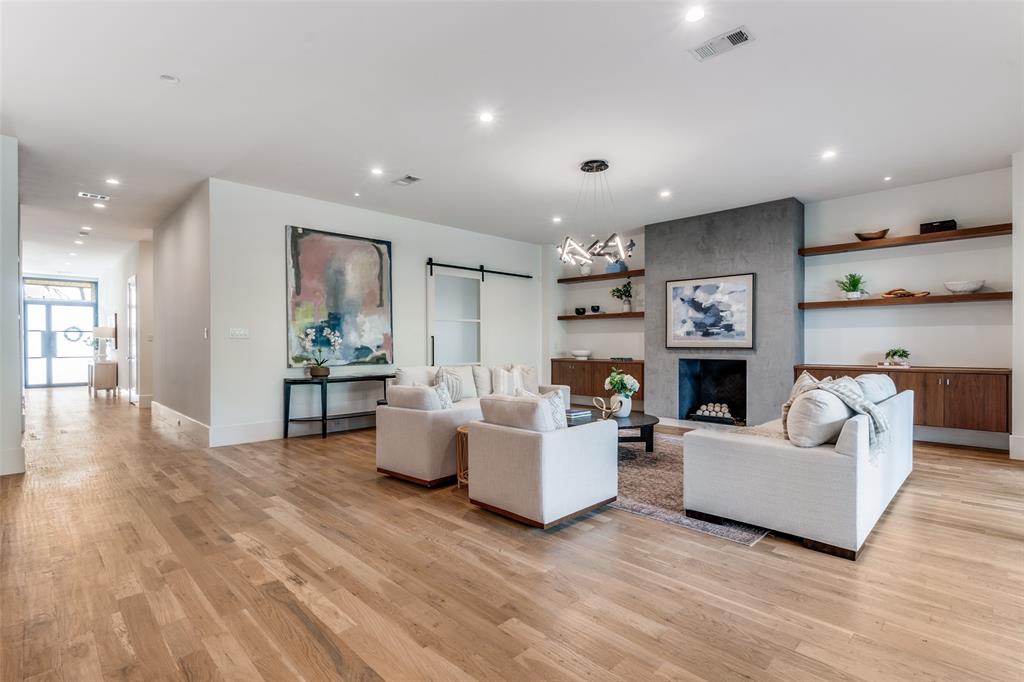 5111 West Amherst Avenue Dallas, TX 75209 - Photo 6 of 36 a living room with furniture and a fireplace